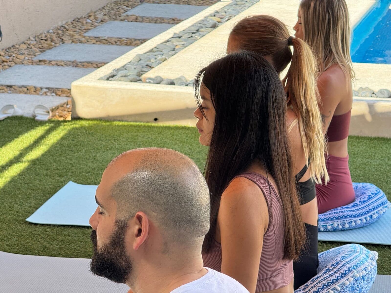Sunlit meditation and yoga space inside the oceanfront villa